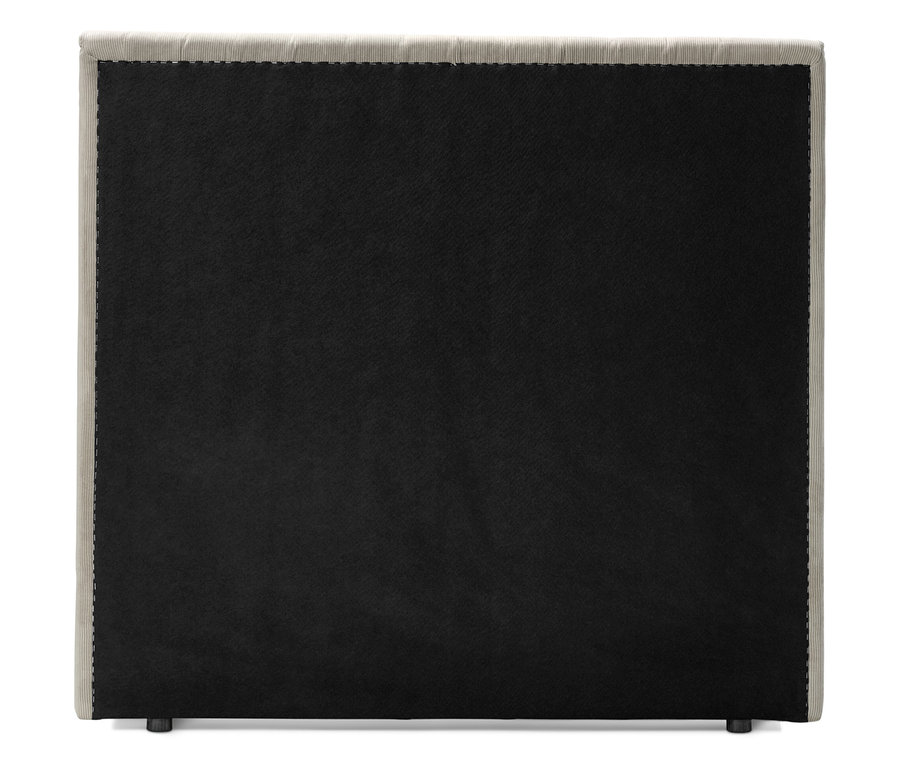 Vue arrière d'un lit à sommier tapissier beige avec tissu noir et petits pieds.