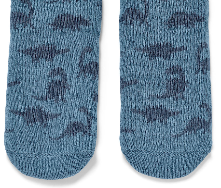 Détail de 2 paires de chaussettes antidérapantes pour enfant avec motif de dinosaures.
