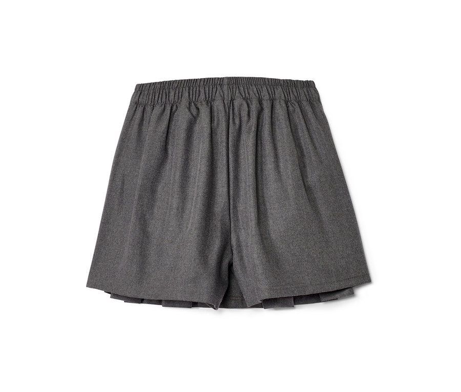 Une jupe culotte enfant grise sur fond blanc.