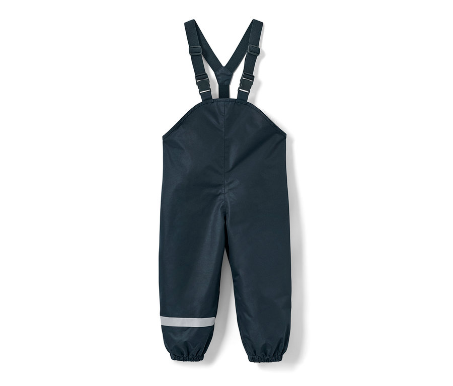 Pantalon de pluie bleu marine pour enfant avec une bande réfléchissante sur la jambe.