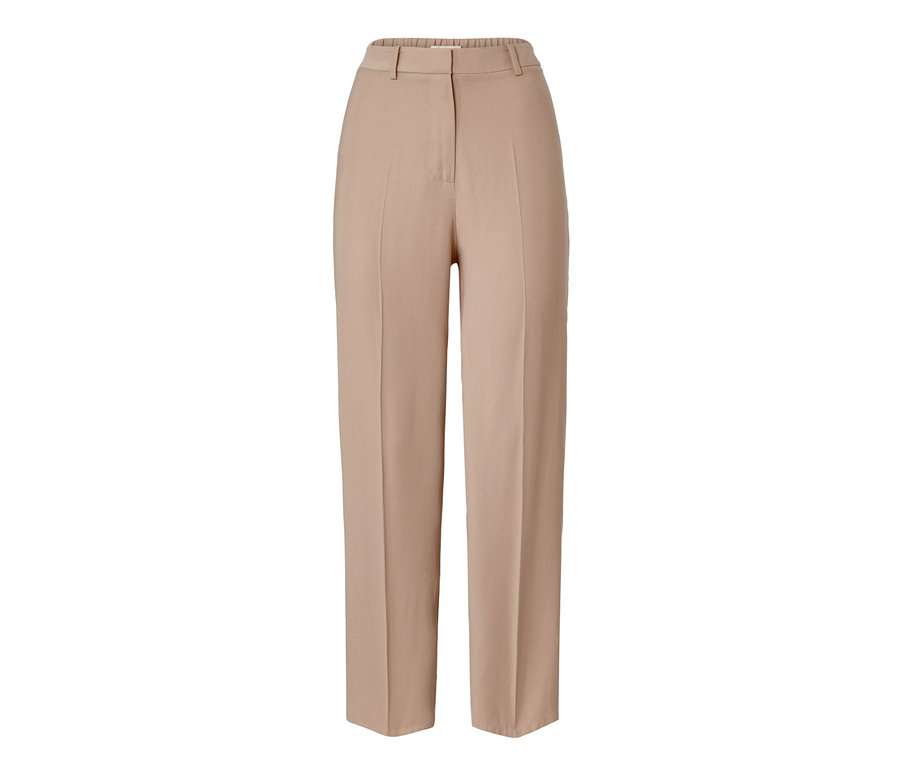 Un pantalon tissé beige.