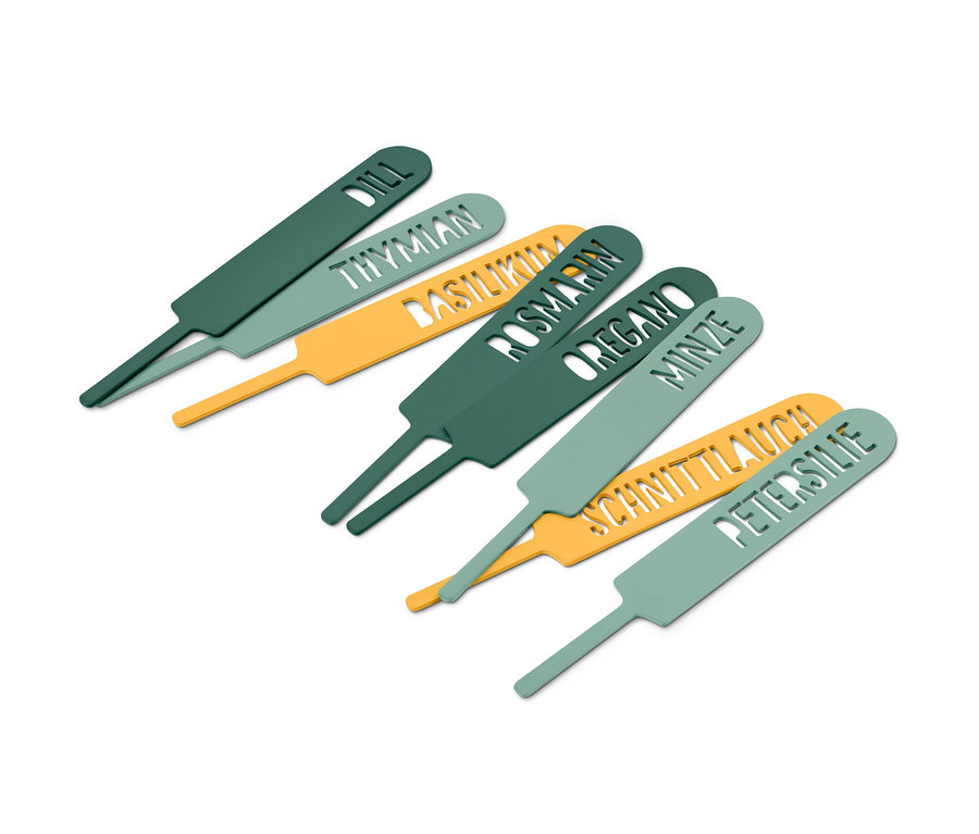 Étiquettes de jardin pour herbes aromatiques vertes et jaunes avec des noms d'herbes découpés.