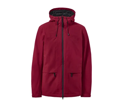 Une veste d'extérieur rouge avec gilet et une fermeture éclair au milieu.