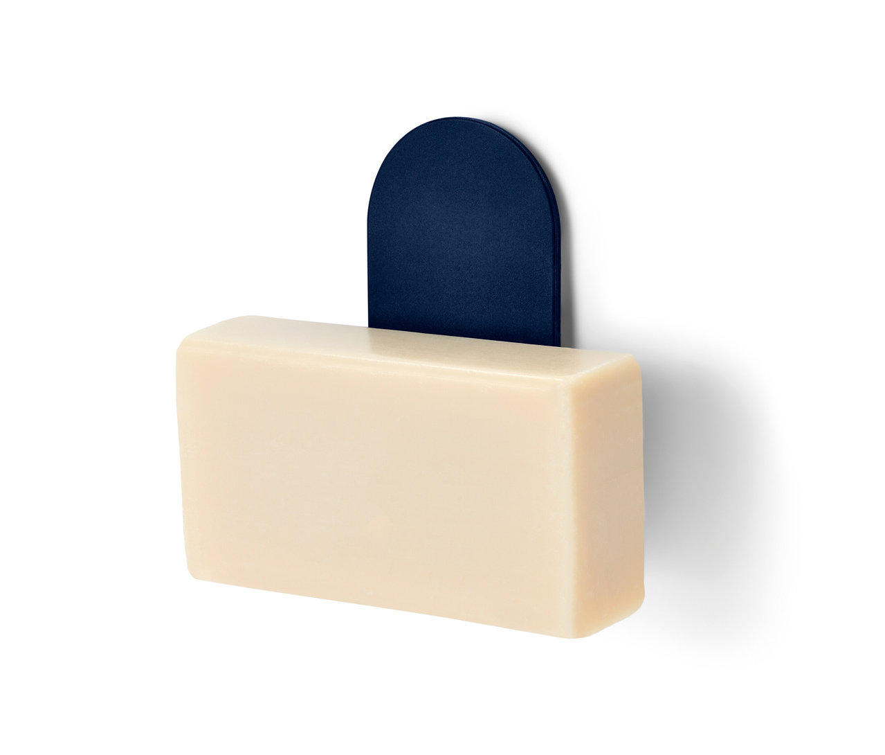 Porte-savon aimanté avec savon beige.