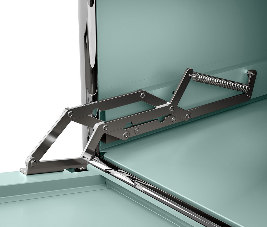 Vue détaillée d'un mécanisme métallique avec ressort fixé à une armoire turquoise.