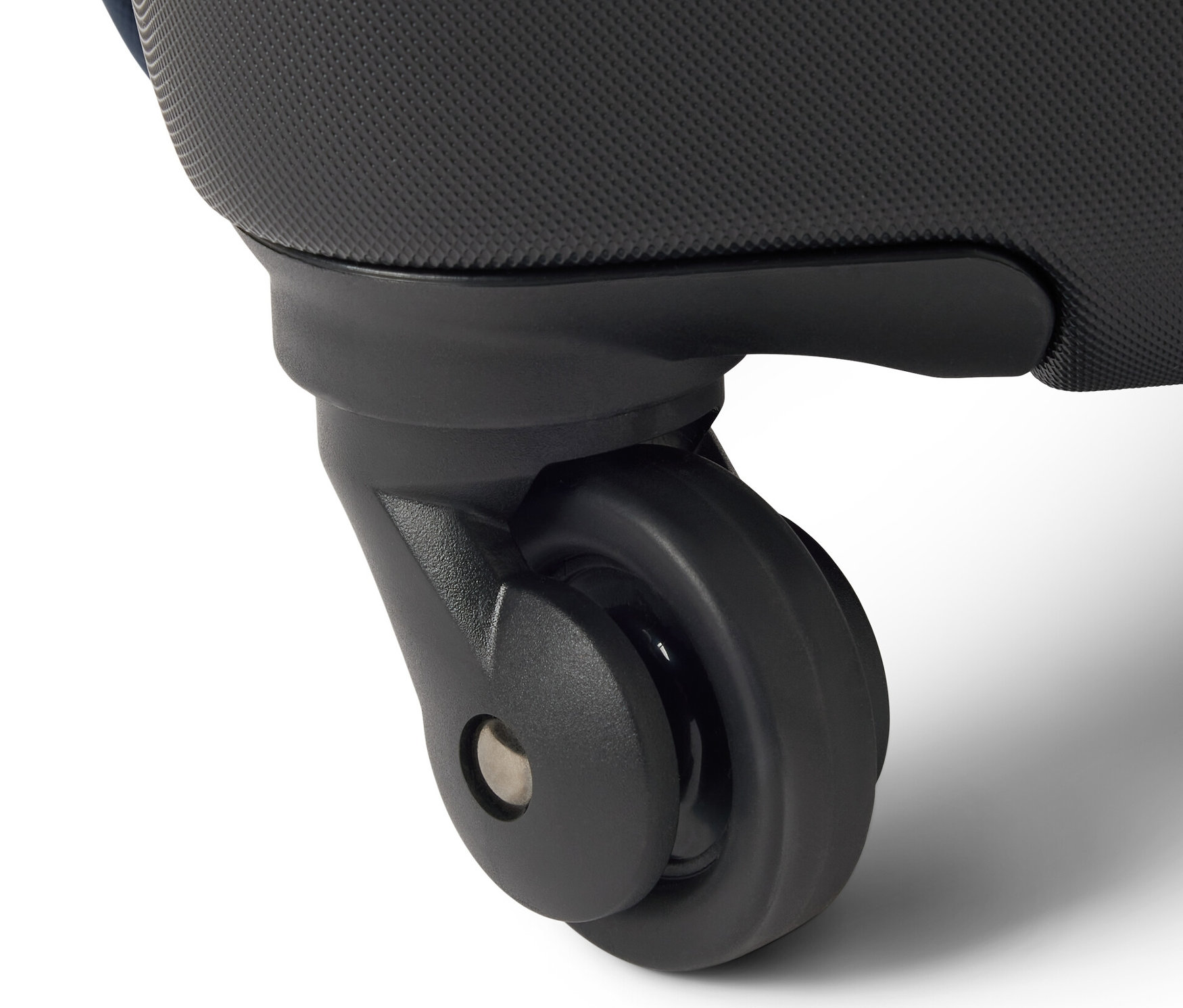 Gros plan d'une roulette de rechange noire pour valise hybride.