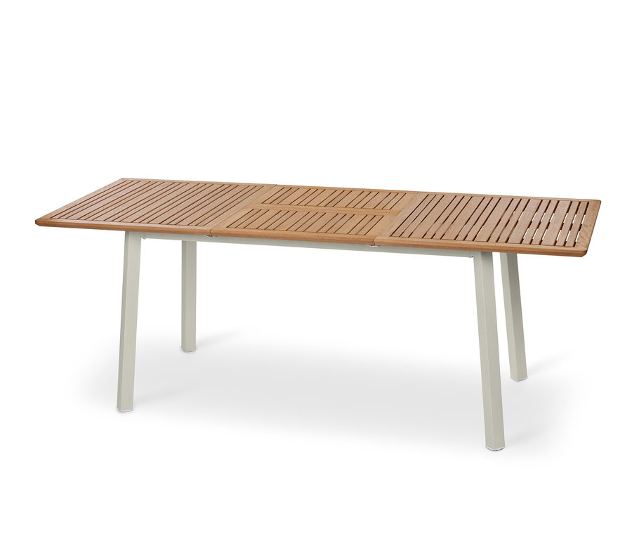 Une table à rallonge « Liska » avec un plateau en bois et des pieds clairs.