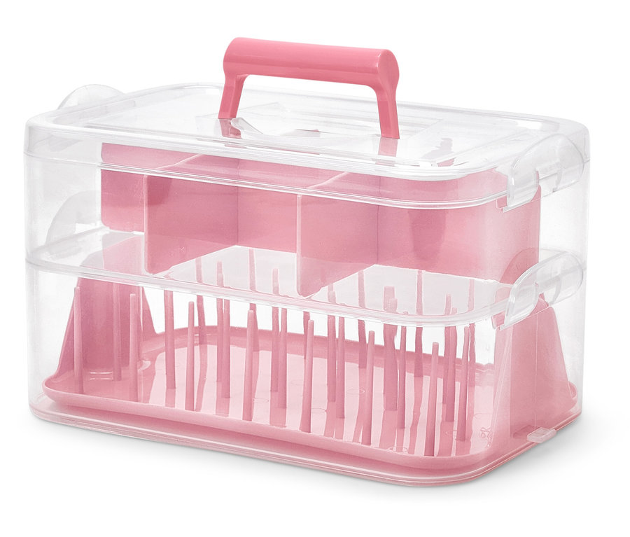 Boîte à outils rose en plastique.