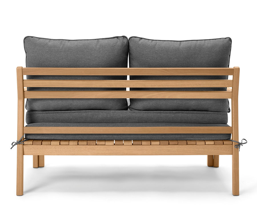 Canapé lounge extensible avec coussins gris et cadre en bois.