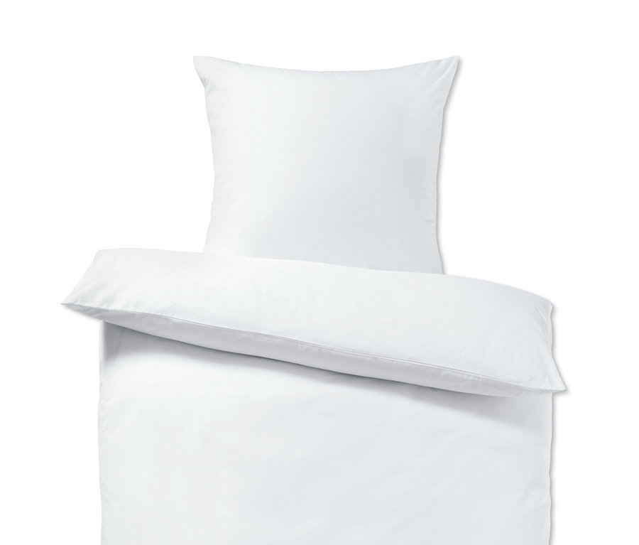 Parure de lit double blanche en percale et taie d'oreiller blanche en percale.