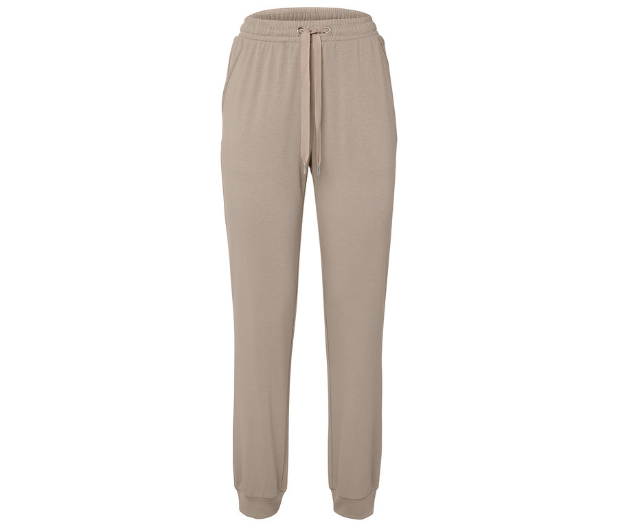 Pantalon de jogging beige avec cordon de serrage à la taille.