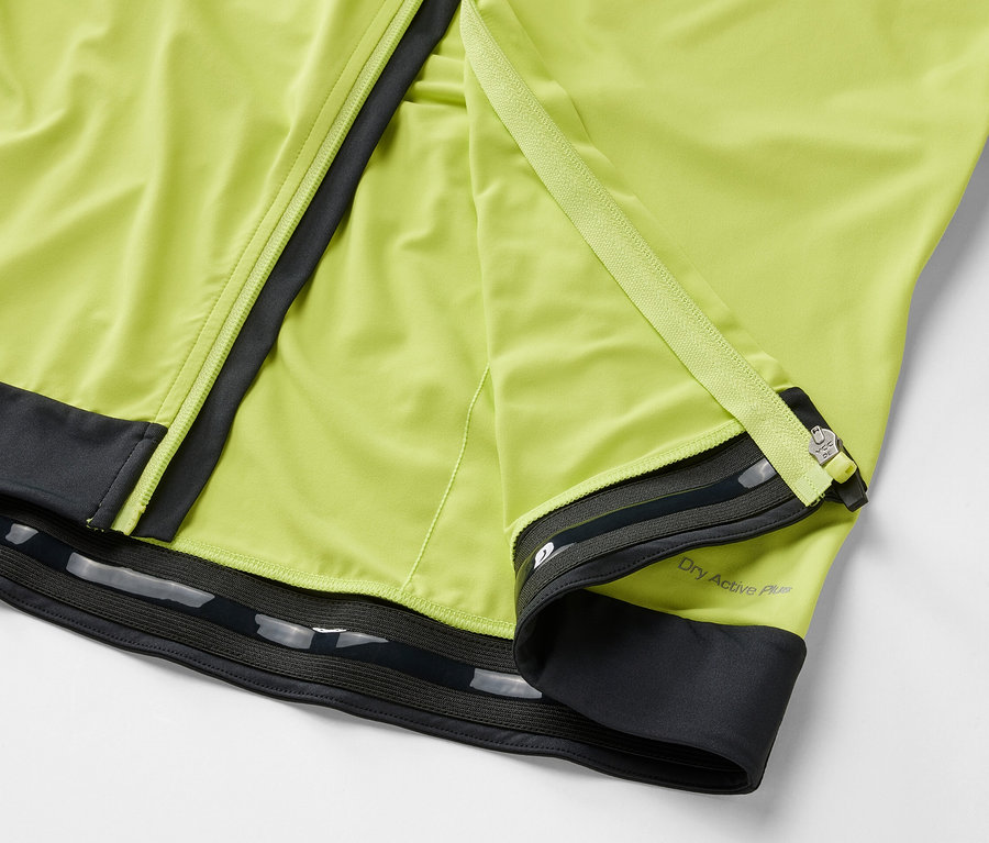 Détail d'un maillot de cyclisme jaune avec fermeture éclair.