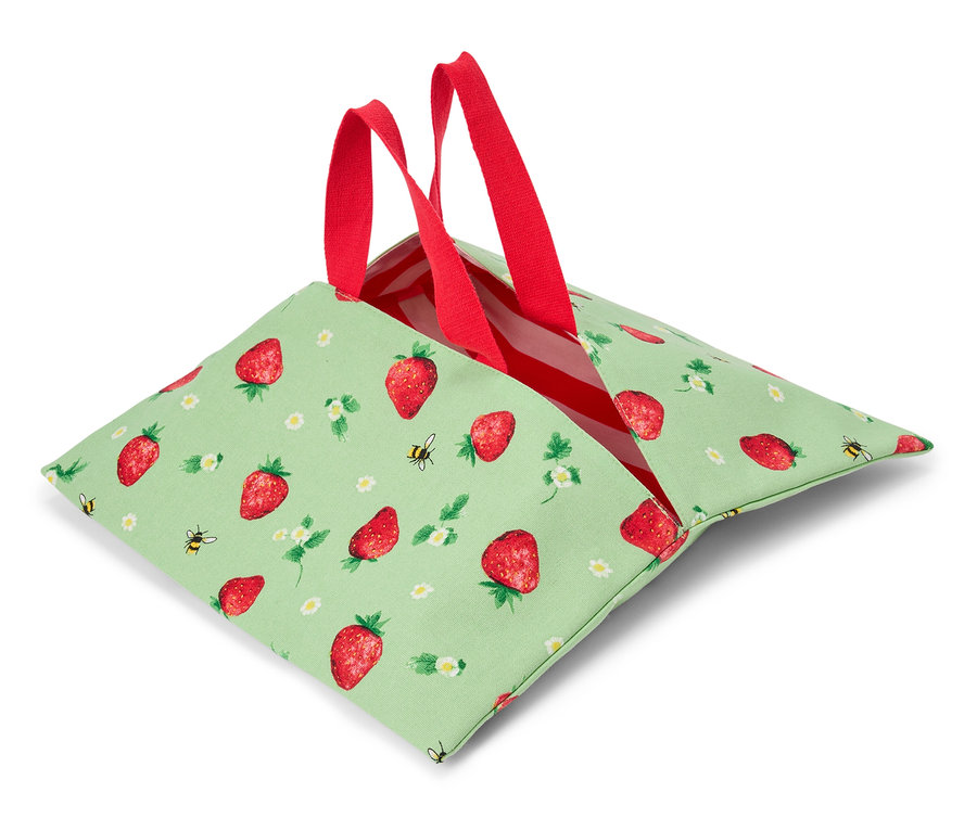 Sac ouvert vert clair avec des fraises, des petites fleurs, des abeilles et des poignées rouges.