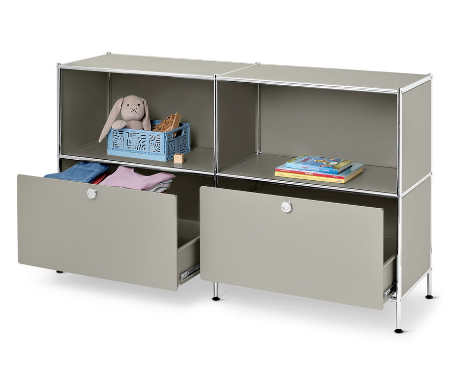 Étagère modulaire grise avec des jouets et des livres, un tiroir est ouvert.