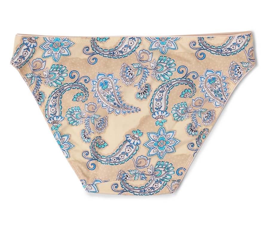 Pantalon avec motif floral bleu sur fond beige.