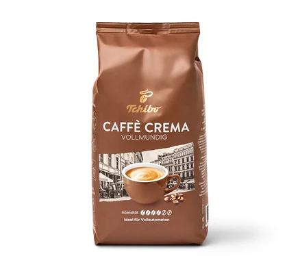 Paquet brun de 1 kg de café en grains Tchibo Caffè Crema Vollmundig, avec une tasse de café et des grains sur l'étiquette.