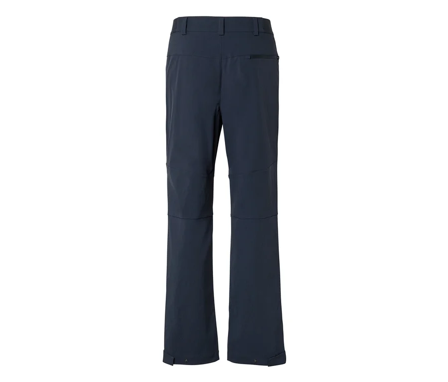 Pantalon bleu foncé vu de dos, avec passants de ceinture, une poche zippée à l'arrière droit et des zones de genoux renforcées.