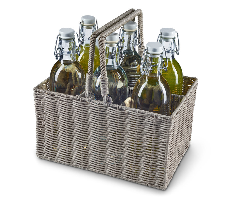 Six bouteilles dans un panier porte-bouteille.