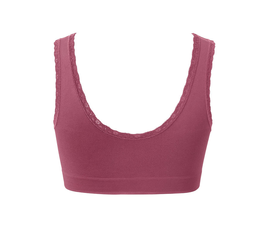 Gros plan d'une brassière sans coutures mauve avec de la dentelle.