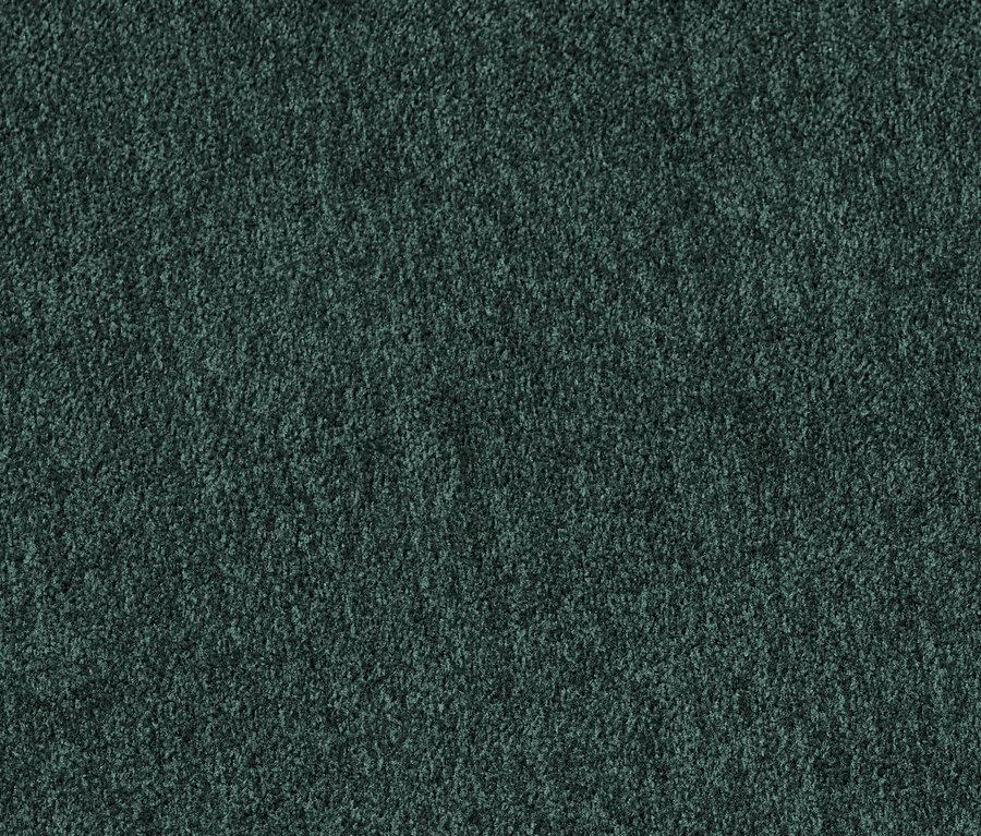 Gros plan d'une chaise rembourrée gris-vert.