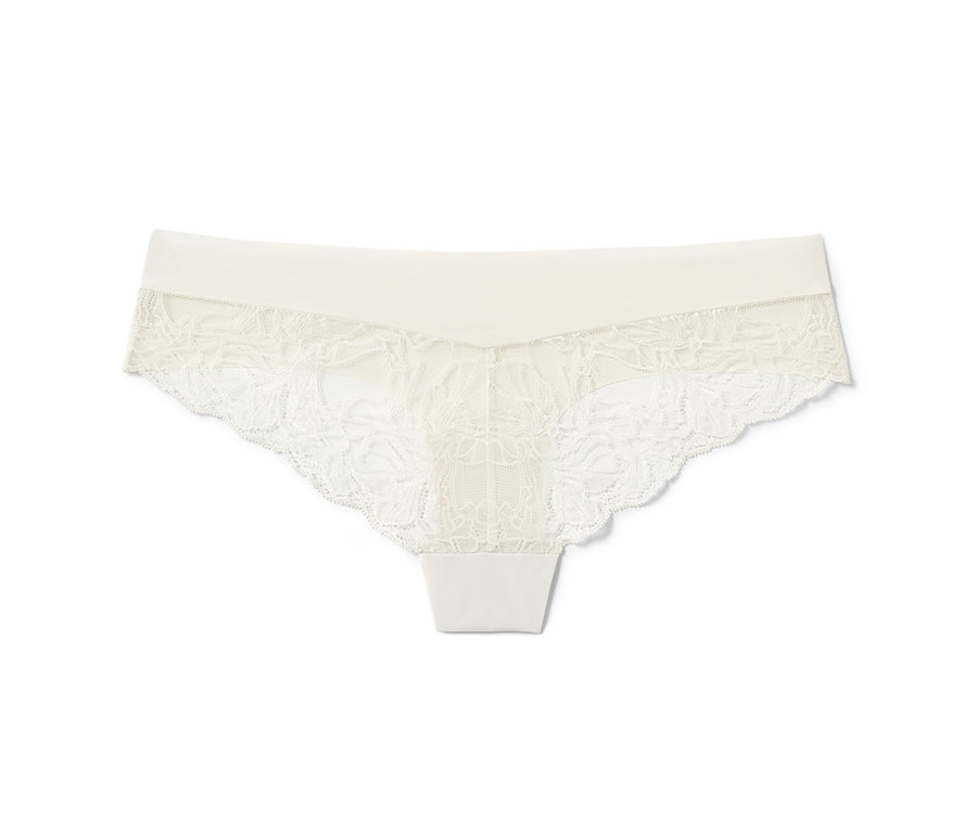 Un slip brésilien Magic Cut crème avec de la dentelle florale.