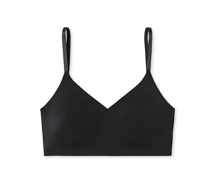 Brassière invisible SCHIESSER noire avec coussinets, fines bretelles et décolleté en V, posée à plat sur un fond blanc.
