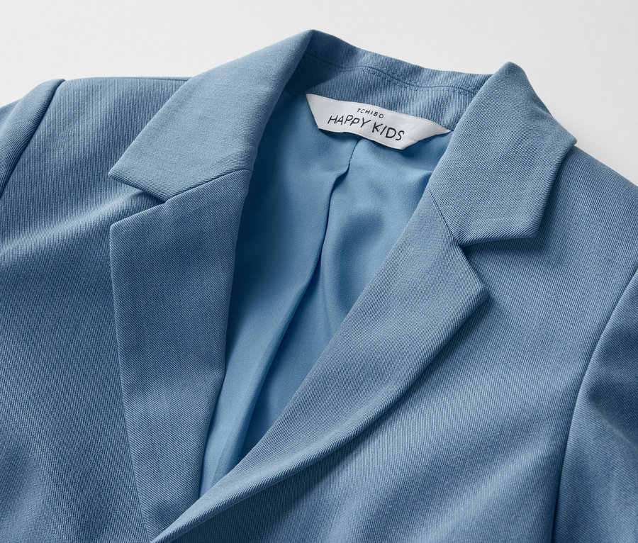 Détail d'un veston pour enfant.