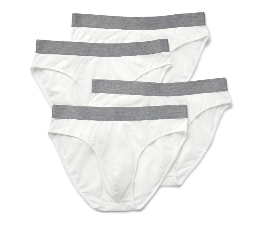 Quatre slips blancs avec ceinture grise.
