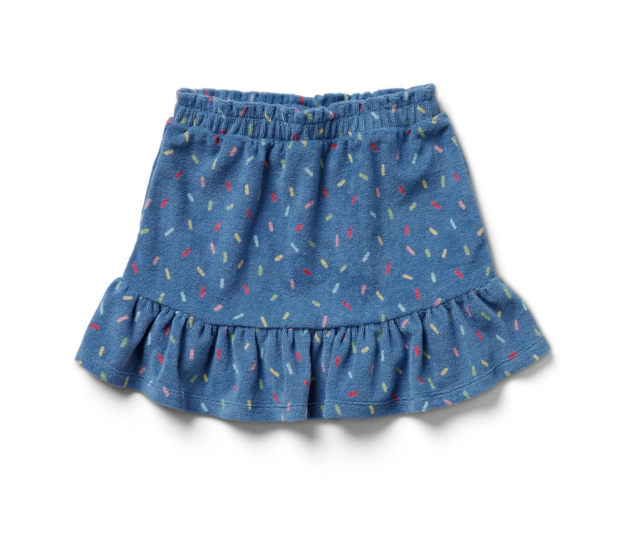 Une jupe éponge bleue pour enfants avec des confettis colorés.