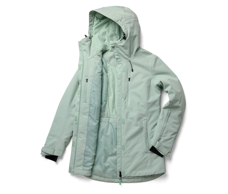 Veste ouverte vert clair avec capuche. La veste a une fermeture éclair et plusieurs poches.