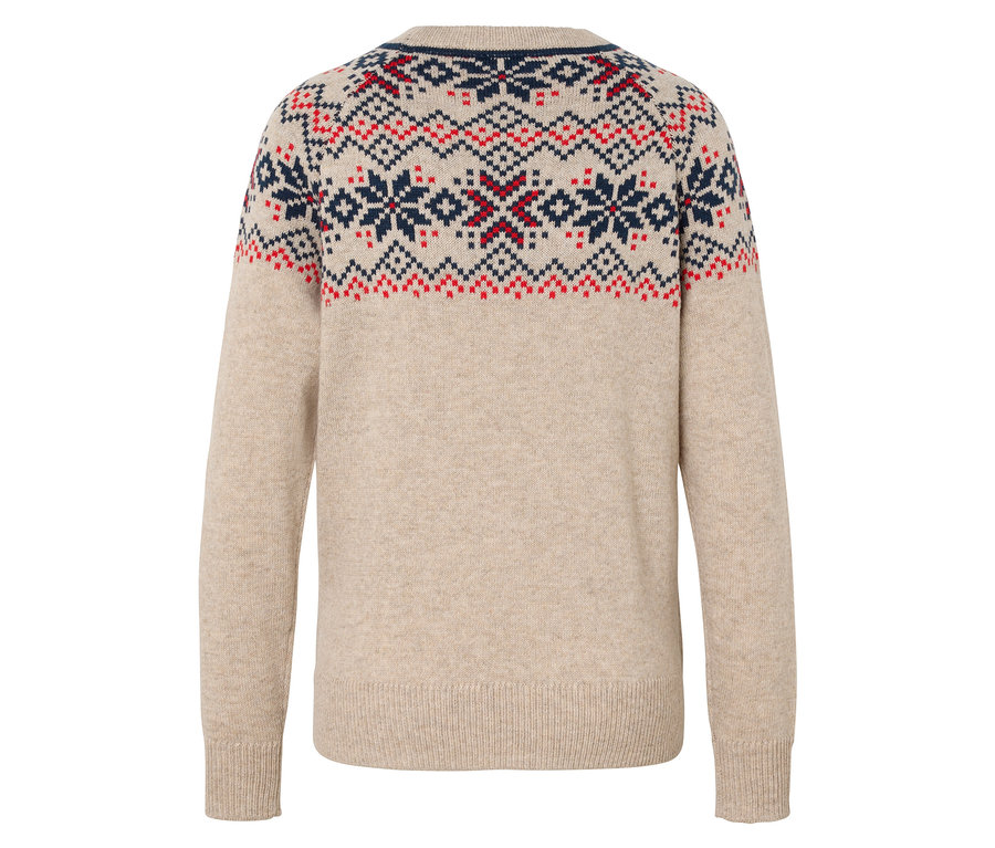 Détail du dos d'un pull beige avec un motif de flocons de neige rouges et bleu marine.