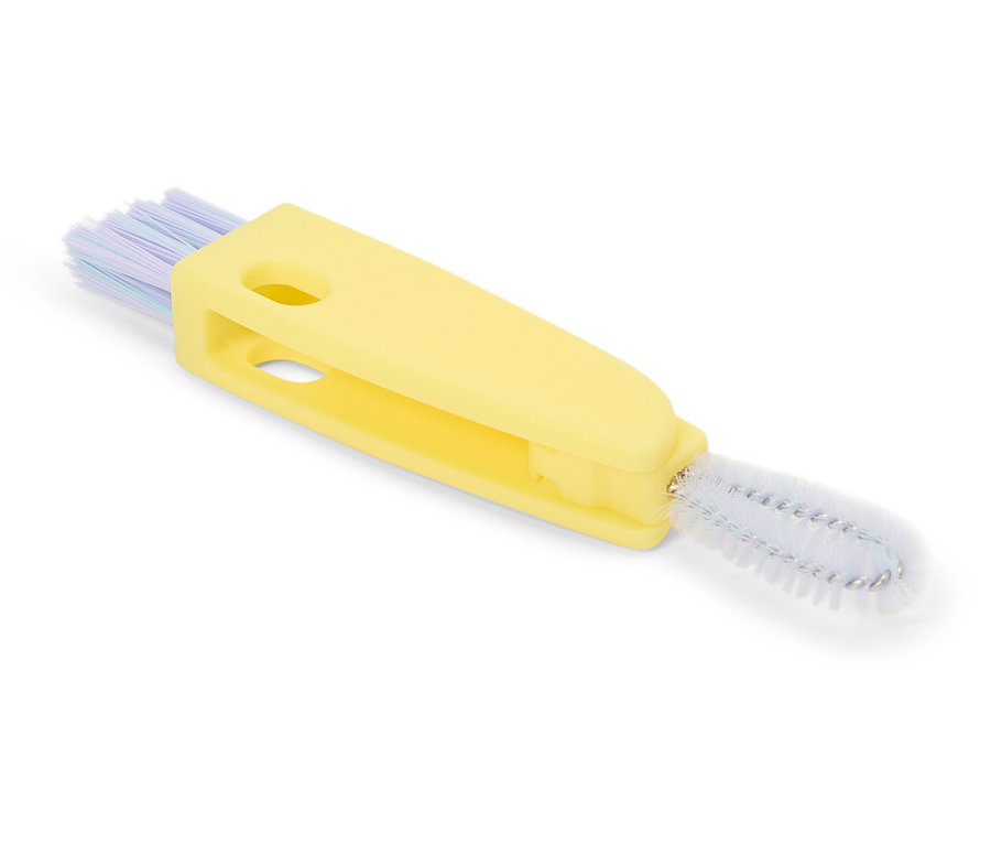 Goupillon de nettoyage de bouteille jaune avec des poils bleus et une brosse.