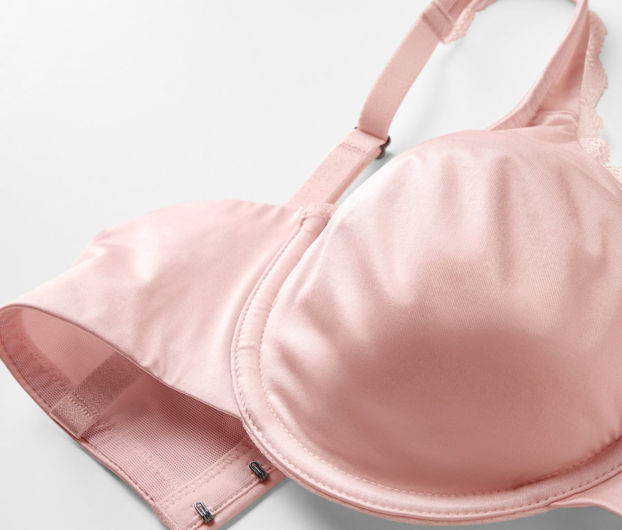 Gros plan d'un soutien-gorge à armatures rose.