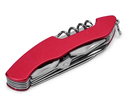 Gros plan d'un couteau suisse rouge avec tire-bouchon et divers outils partiellement sortis.