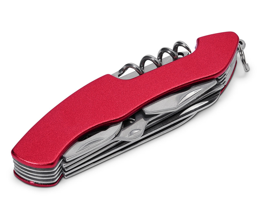 Gros plan d'un couteau suisse rouge avec tire-bouchon et divers outils partiellement sortis.