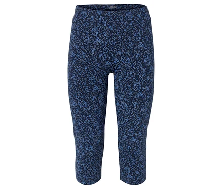 Leggings bleus longueur genou avec un motif floral sur un fond blanc.