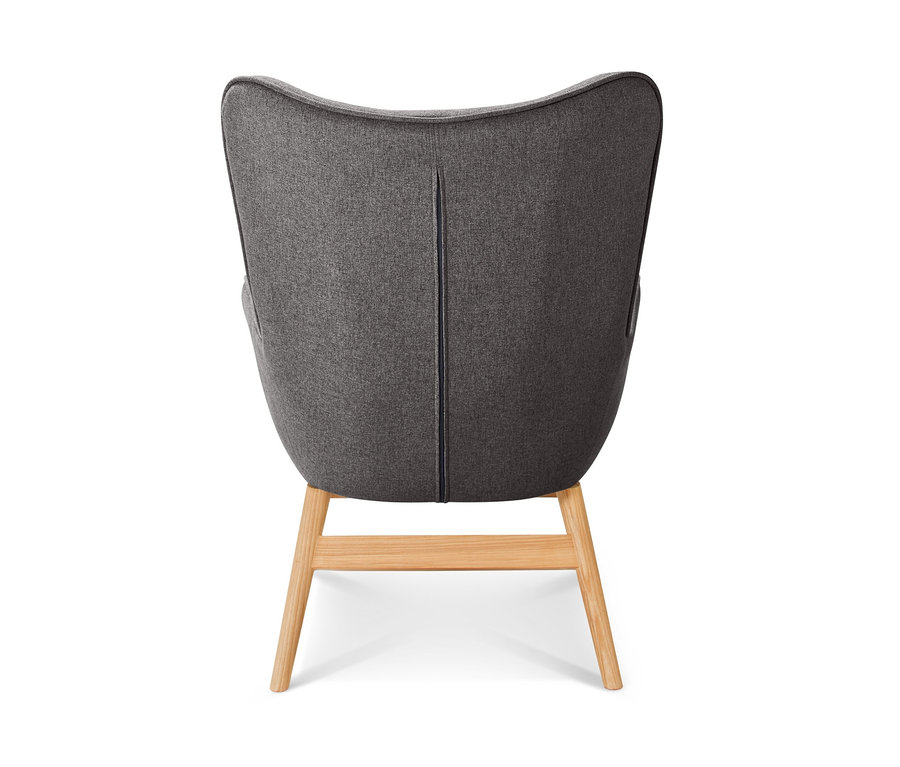 Vue arrière d'un fauteuil inclinable gris foncé avec repose-pieds.