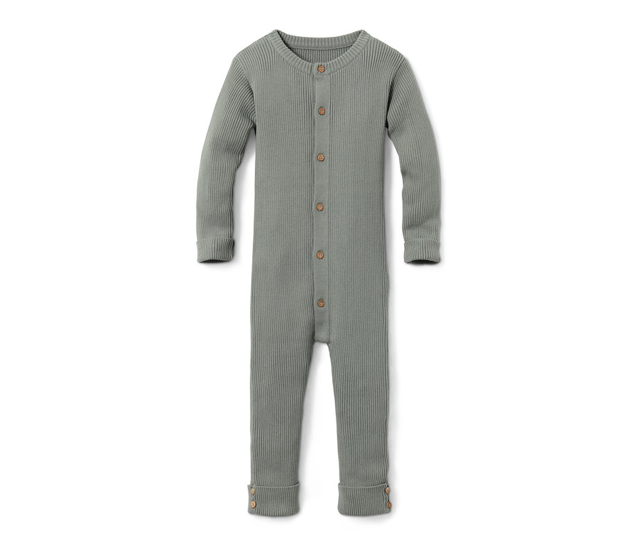 Combinaison en maille verte avec boutons.