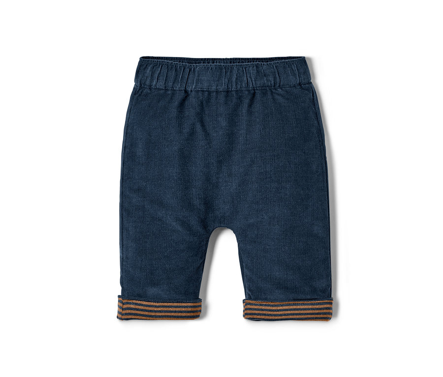 Un pantalon réversible bleu marine en velours côtelé avec des poignets à rayures marron.