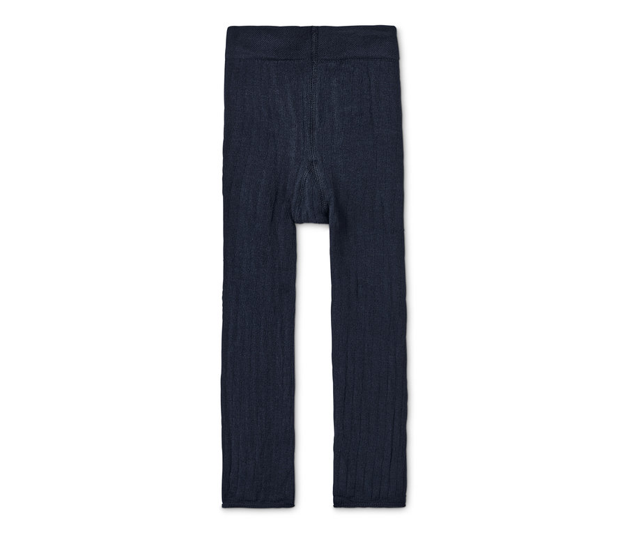 Gros plan sur un legging en maille bleu foncé.