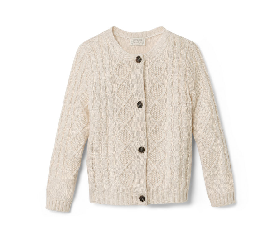 Une jaquette en maille beige clair avec de la laine RWS et des boutons marron.