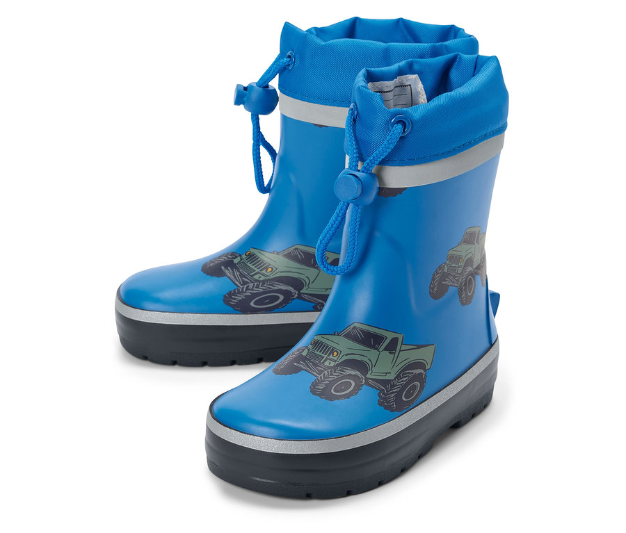 Bottes en caoutchouc pour enfants avec imprimé de tracteurs.