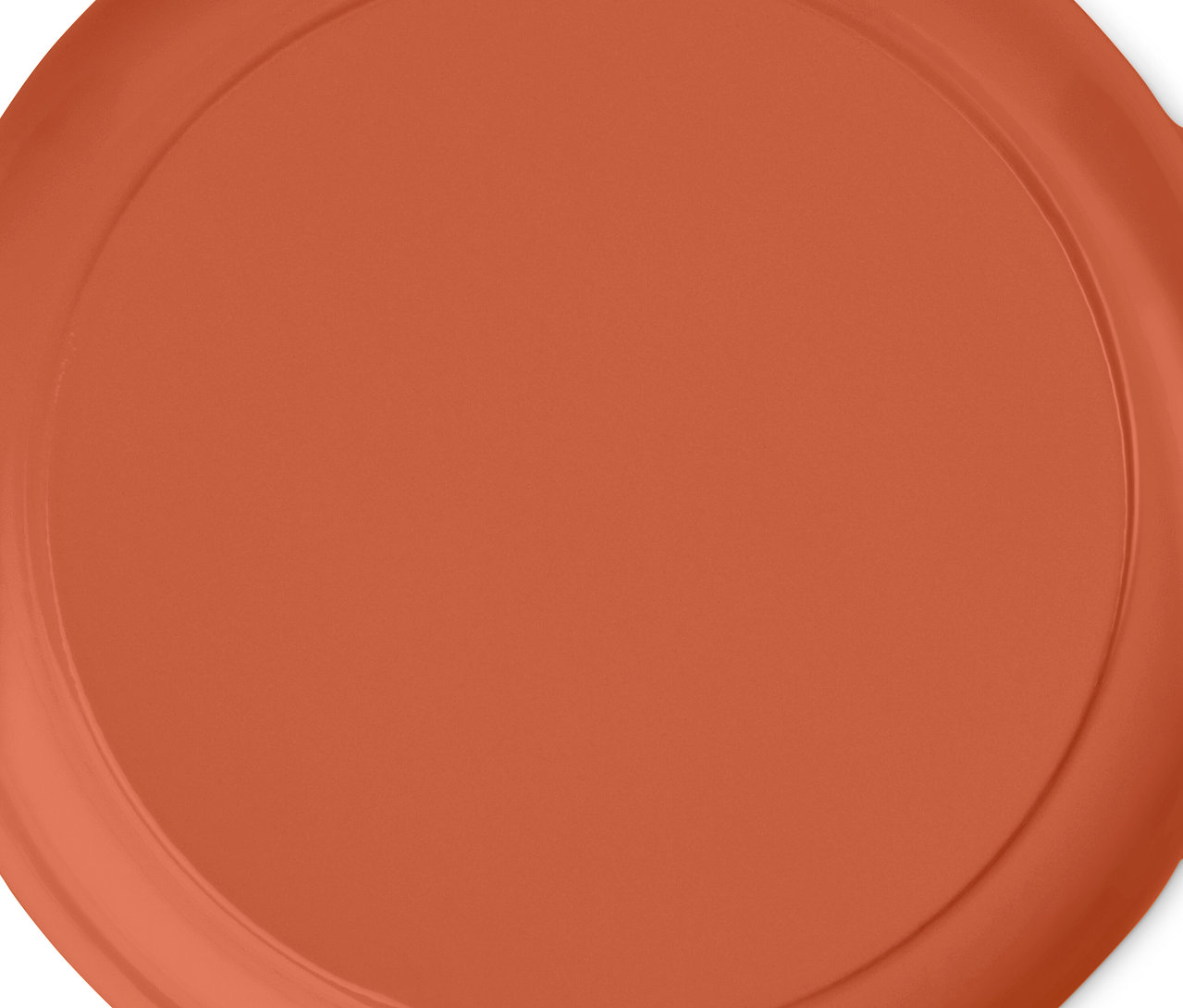 Détail d'une cocotte basse en fonte.