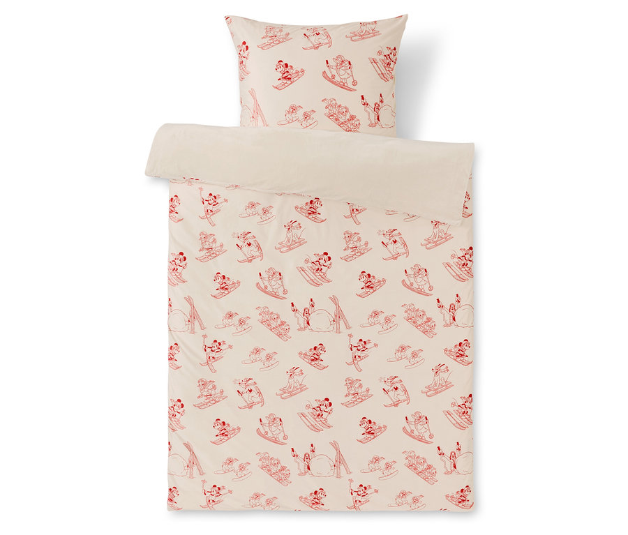 Linge de lit avec un motif rouge de personnages faisant du ski sur fond blanc.