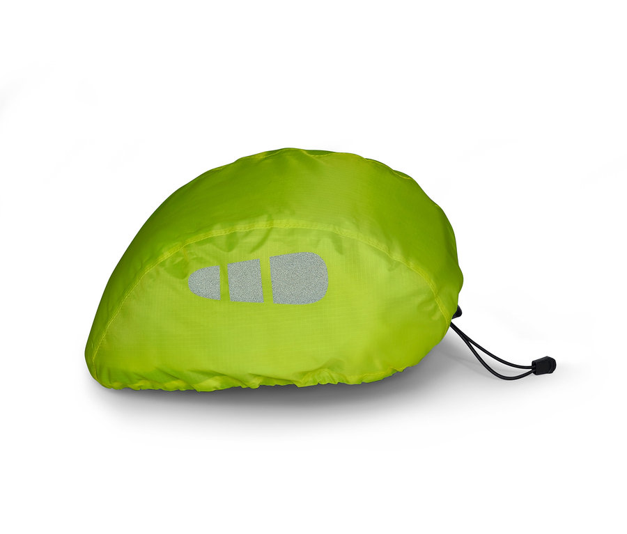Une housse verte avec des éléments réfléchissants sur un fond blanc.