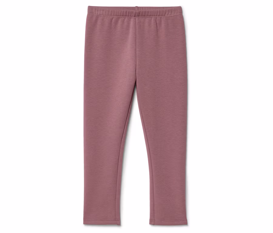 Un legging mauve avec une taille élastique est posé sur un fond blanc.