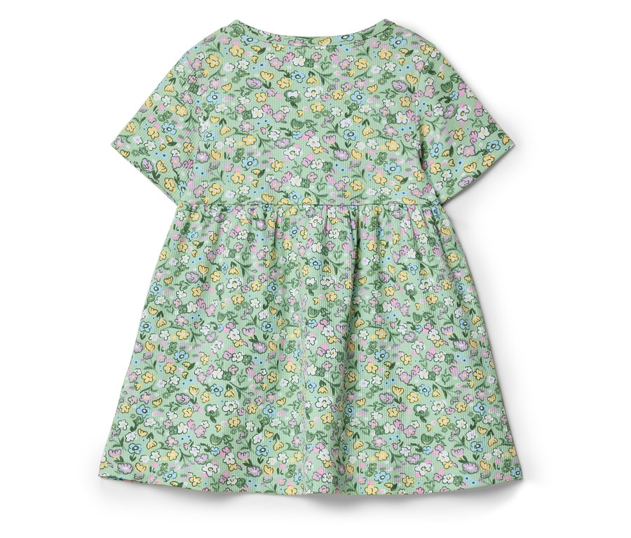 Une robe vert clair à manches courtes avec un motif floral.