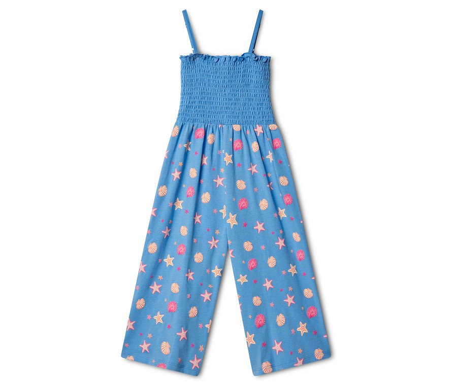 Combinaison tissée pour enfant, longueur 7/8, de couleur bleue, avec un haut smocké et des bretelles spaghetti. Le pantalon est orné d'un motif de coquillages et d'étoiles de mer roses et oranges.