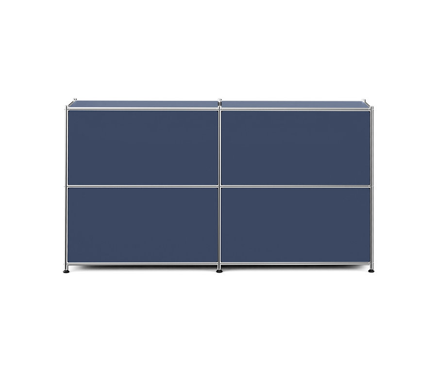 Un meuble de rangement modulaire bleu foncé avec un cadre argenté, composé de deux sections, chacune avec deux compartiments rectangulaires, reposant sur de petits pieds.