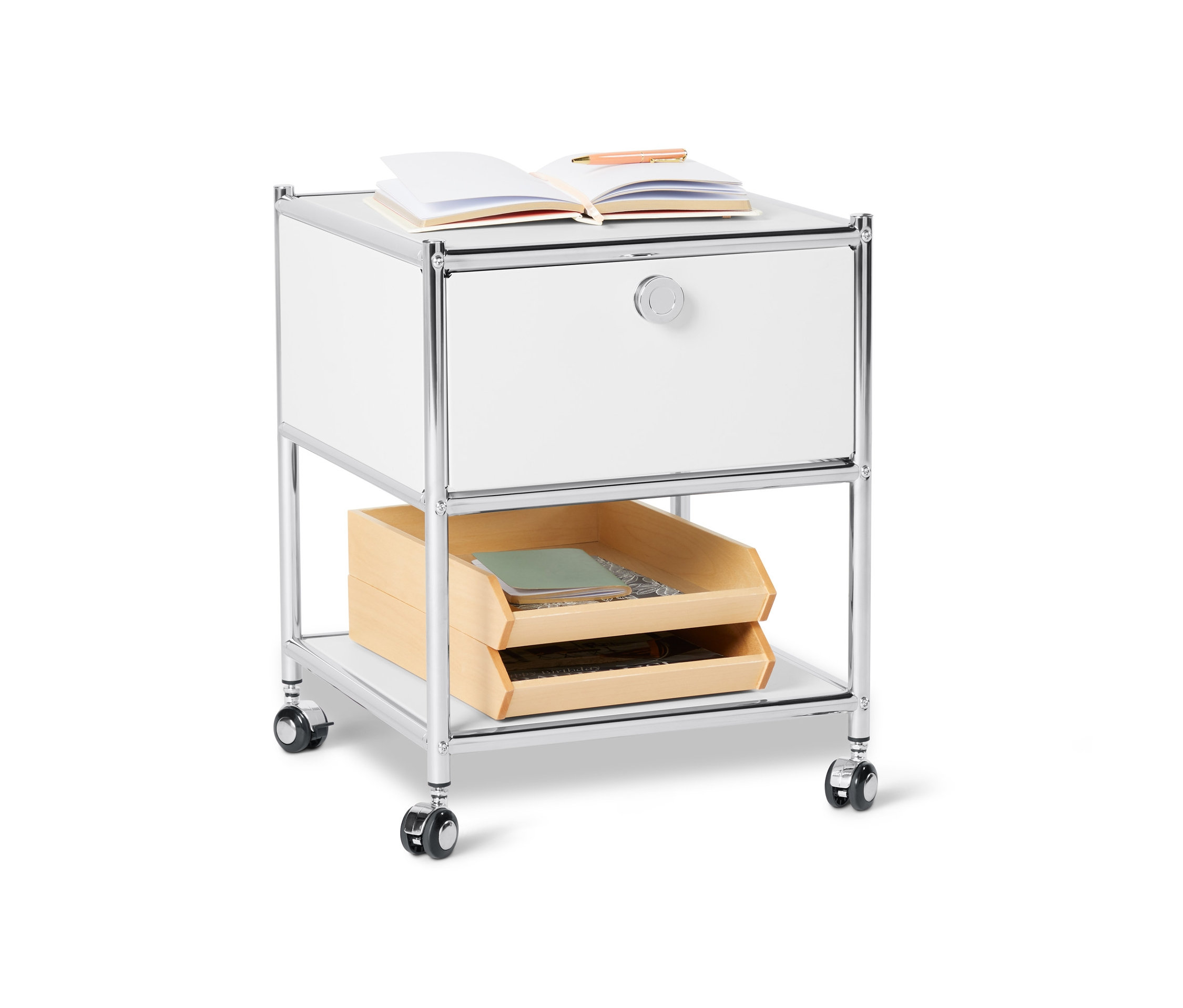 Table d'appoint blanche en métal « CN3 » avec tiroir et roulettes. Un livre ouvert est posé sur la table.